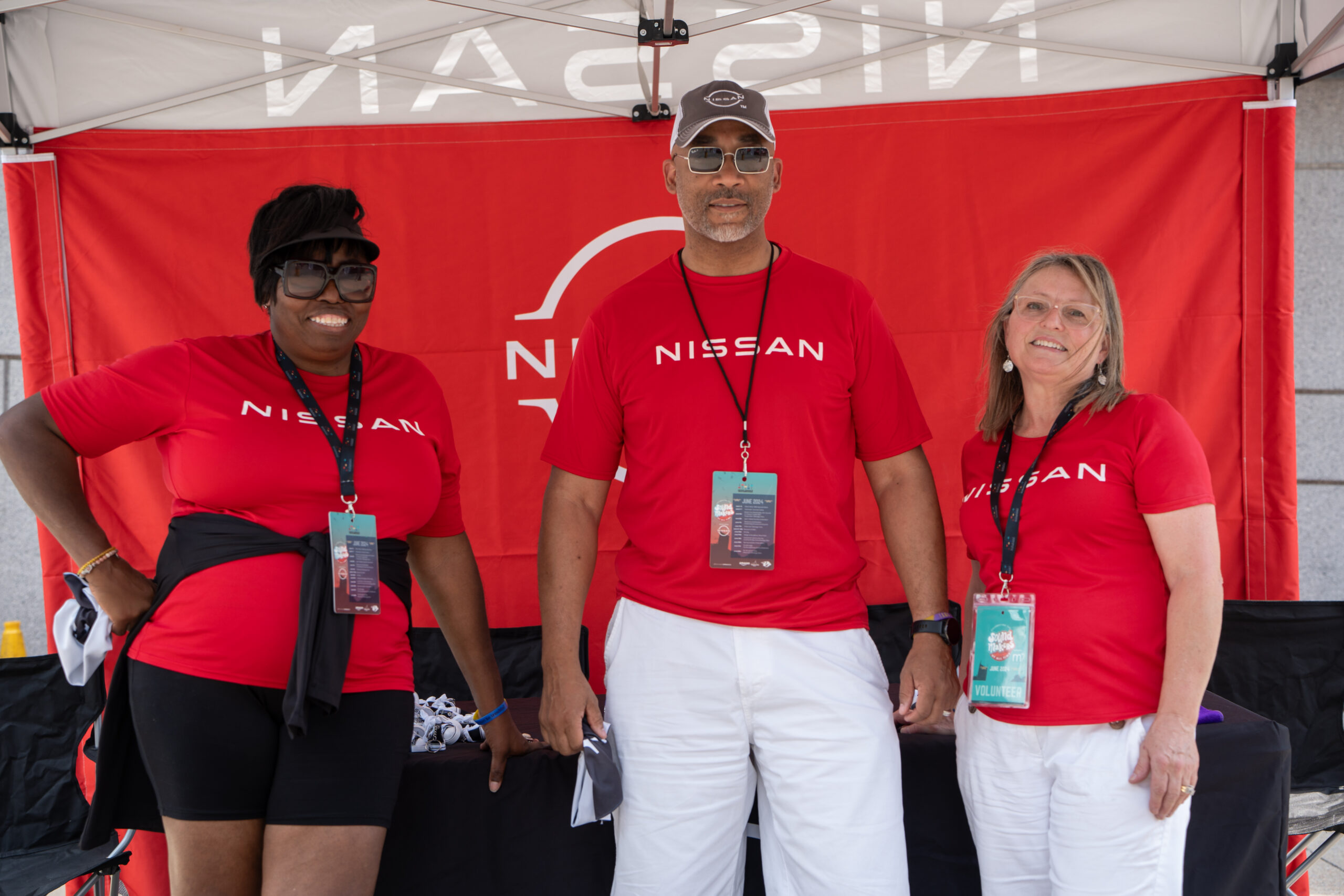 Nissan volunteers at table