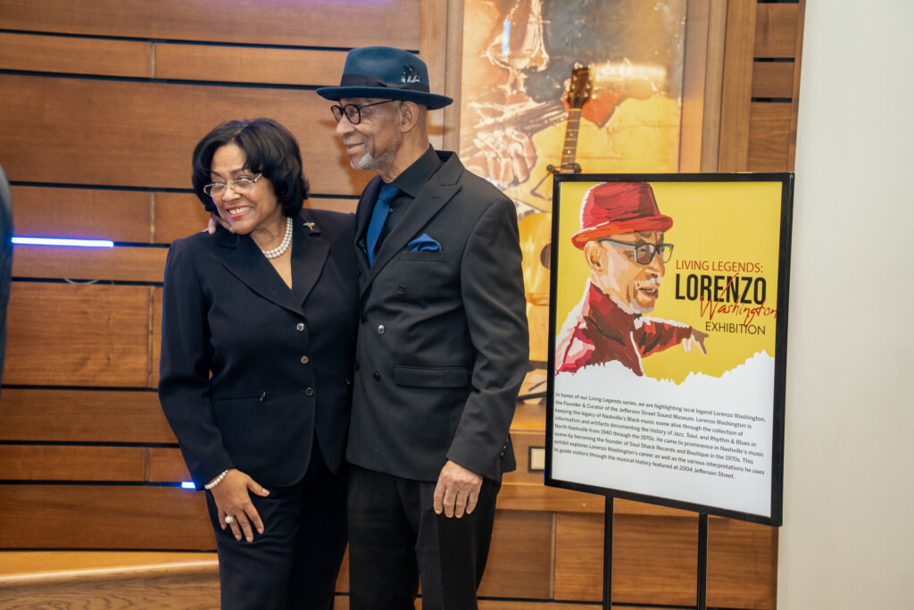 Lorenzo Washington and wife smiling for camera
