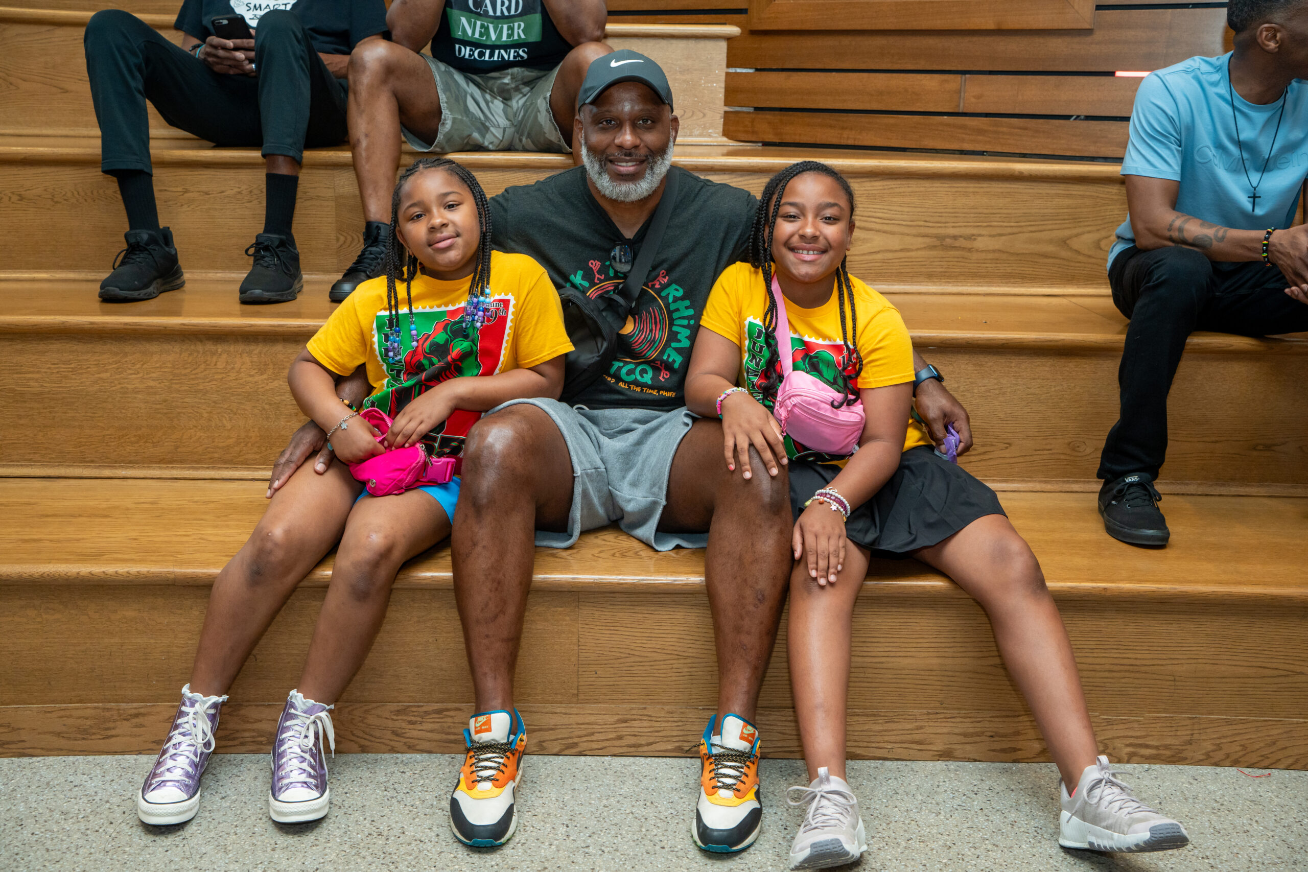 father and twin daughters