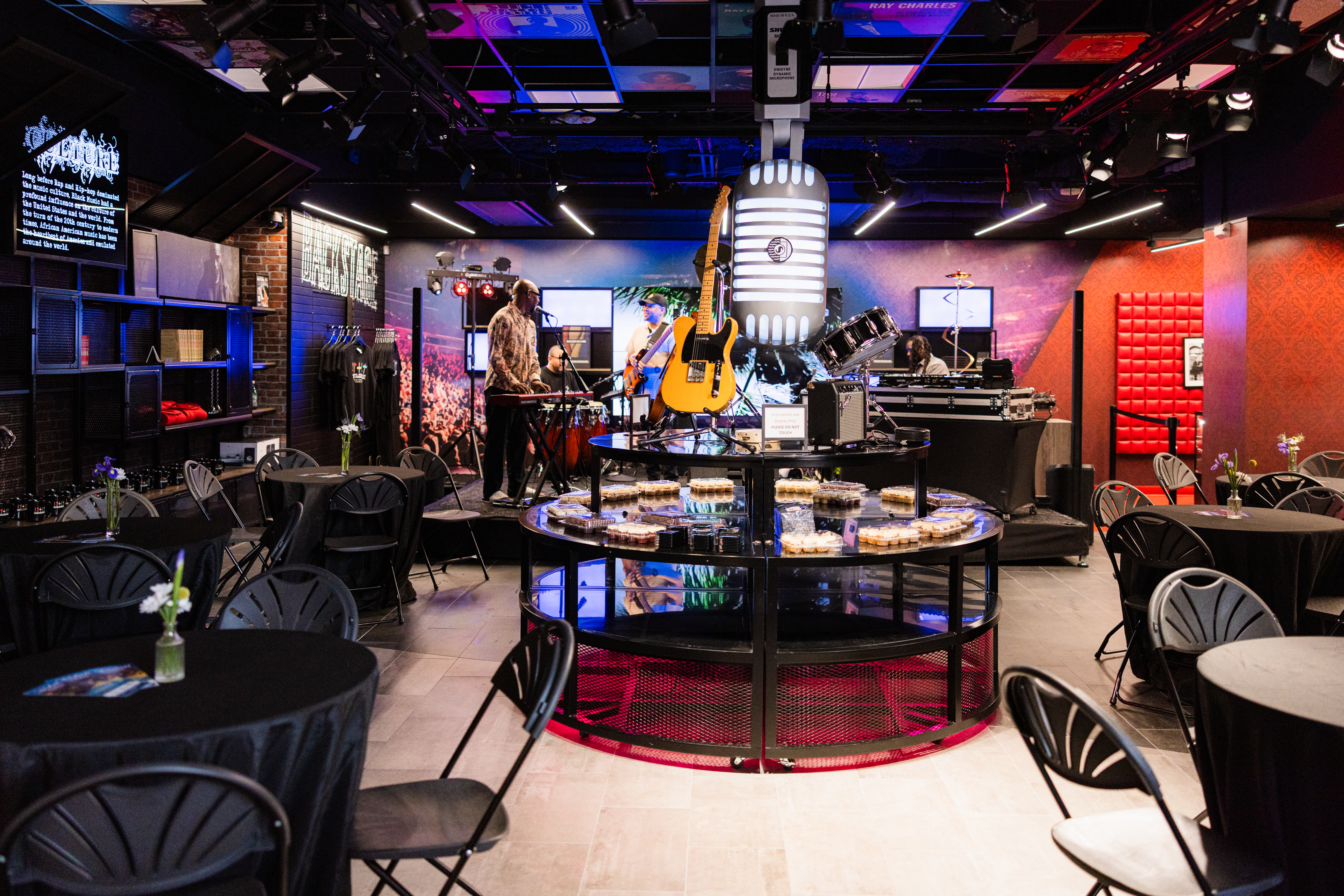 Amplify store with stage and chairs set up