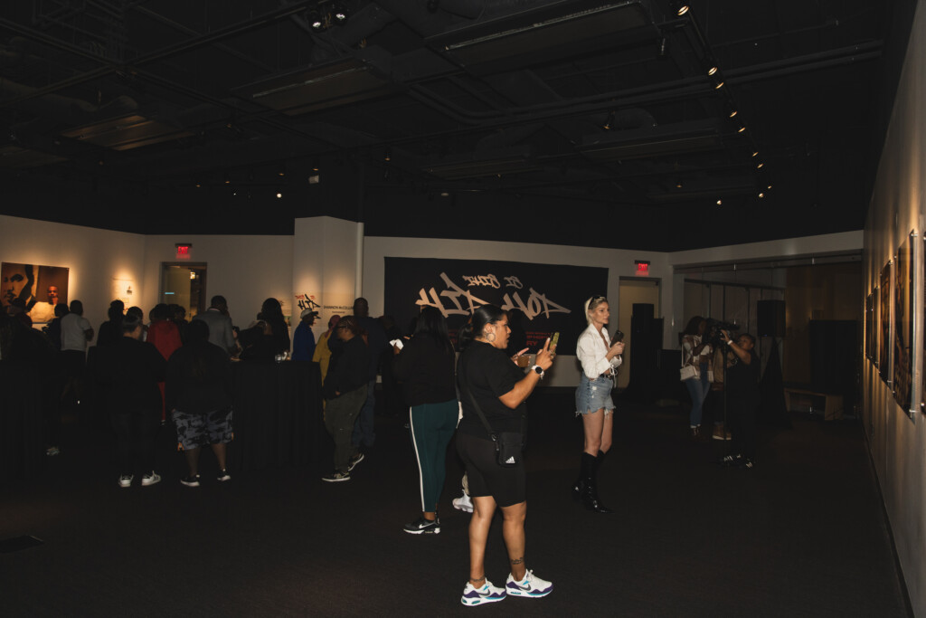 Guests mingling in gallery
